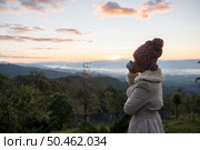 Woman wake up relax in morning on th mountain. Стоковое фото, агентство Ingram Publishing / Фотобанк Лори