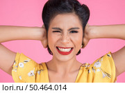 Fashion woman hand cover her ears. Стоковое фото, агентство Ingram Publishing / Фотобанк Лори