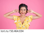 Fashion woman hand cover her ears. Стоковое фото, агентство Ingram Publishing / Фотобанк Лори