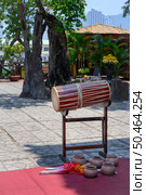 A traditional ancient vietnamese drum and clay pots at the Po Nagar Cham Tower Complex in Nha Trang, Vietnam. Стоковое фото, фотограф Сергей Фролов / Фотобанк Лори