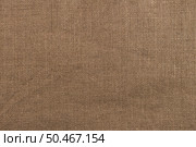 Closeup detail of brown fabric texture background. Стоковое фото, агентство Ingram Publishing / Фотобанк Лори