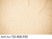 Cream textured paper closeup, can be used as a background. Стоковое фото, агентство Ingram Publishing / Фотобанк Лори