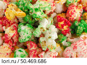 Popped color kernels of pop corn snack background. Стоковое фото, агентство Ingram Publishing / Фотобанк Лори