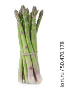 Fresh green asparagus isolated on white background. Стоковое фото, агентство Ingram Publishing / Фотобанк Лори