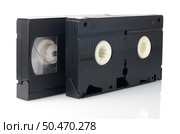 Old VHS Video tapes isolated on white background. Стоковое фото, агентство Ingram Publishing / Фотобанк Лори