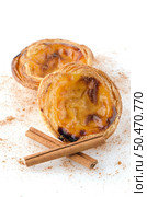 Pasteis de nata, typical pastry from Lisbon - Portugal, isolated on white background. Стоковое фото, агентство Ingram Publishing / Фотобанк Лори