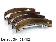 Car brake pads on white reflective background. Стоковое фото, агентство Ingram Publishing / Фотобанк Лори