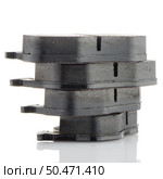 Car brake pads on white reflective background. Стоковое фото, агентство Ingram Publishing / Фотобанк Лори