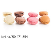 Colorful French Macarons on the white background. Стоковое фото, агентство Ingram Publishing / Фотобанк Лори