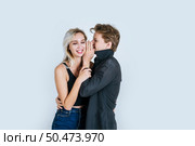 Happy couple whispering something. Стоковое фото, агентство Ingram Publishing / Фотобанк Лори