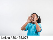 little girl acting Shout in studio shot. Стоковое фото, агентство Ingram Publishing / Фотобанк Лори