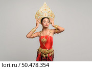 Women wearing Thai clothes and handles on the crown. Стоковое фото, агентство Ingram Publishing / Фотобанк Лори