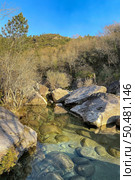 Water stream near Fecha de Barjas waterfall (also known as Tahiti waterfall) in the mountains of Peneda-Geres National Park, Portugal. Стоковое фото, агентство Ingram Publishing / Фотобанк Лори