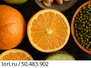 close up with Slice of fresh orange, mung bean, and avocado. Стоковое фото, агентство Ingram Publishing / Фотобанк Лори