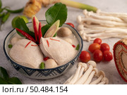 Chicken in coconut milk soup, galangal Lemongrass and Chilli Thai food. Selective focus. Стоковое фото, агентство Ingram Publishing / Фотобанк Лори