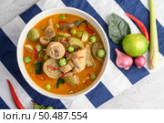 Spicy chicken stir-fried with thai eggplant. Selective focus. Стоковое фото, агентство Ingram Publishing / Фотобанк Лори