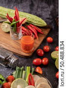 The ingredients used for the salad include tomatoes, peppers, lime and bitter gourd. Стоковое фото, агентство Ingram Publishing / Фотобанк Лори