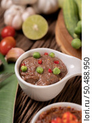 Nam phrik kapi  with Chili and Lemon on wooden floor. Стоковое фото, агентство Ingram Publishing / Фотобанк Лори