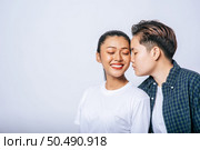 Women couples stand and fragrant cheek. Стоковое фото, агентство Ingram Publishing / Фотобанк Лори