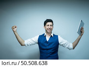 Portrait of Businessman rookie in the new entrepreneurial with a tablet as a tool to help in the work. Стоковое фото, агентство Ingram Publishing / Фотобанк Лори