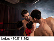 Punching is one of the master techniques of Muay Thai that is used to kick and lift to prevent kicks. which boxers are popularly used as weapons, Muay Thai,Thai martial arts. Стоковое фото, агентство Ingram Publishing / Фотобанк Лори