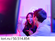 Two professional gamers are in a winning mood. That’s the thrill of victory. Стоковое фото, агентство Ingram Publishing / Фотобанк Лори