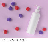 Pump bottle for cream or perfume on pink background. Стоковое фото, агентство Ingram Publishing / Фотобанк Лори