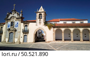 Arcade and clock tower, Sao Joao de Pesqueira, Douro Valley, Portugal. Стоковое фото, агентство Ingram Publishing / Фотобанк Лори