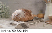 Homemade crispy herbs bread, on a kitchen counter. Стоковое фото, агентство Ingram Publishing / Фотобанк Лори
