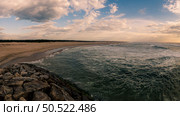 View south of Furadouro beach in Ovar on a stormy day at sunset. Стоковое фото, агентство Ingram Publishing / Фотобанк Лори