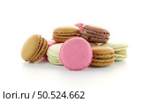 Colorful French Macarons on the white background. Стоковое фото, агентство Ingram Publishing / Фотобанк Лори