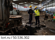 Scientists and government officials Inspect and collect chemical leak samples in industrial sites. to be thoroughly investigated in the laboratory. Стоковое фото, агентство Ingram Publishing / Фотобанк Лори