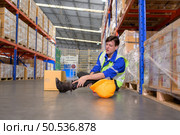 Working in a large industrial facility with heavy materials and machinery. Safety considerations are therefore of the utmost significance. Extreme vigilance must be exercised in this situation. Стоковое фото, агентство Ingram Publishing / Фотобанк Лори