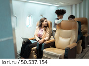 Business people are required to travel frequently for international business. Use the business class service to travel by plane because there are facilities to contact business and convenience. Стоковое фото, агентство Ingram Publishing / Фотобанк Лори