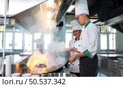 Chefs that specialize in cooking will be meticulous with every cooking process. Even minor details will not be overlooked. As with stir-fry, high heat will be used until a flaming flame appears. Стоковое фото, агентство Ingram Publishing / Фотобанк Лори