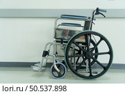 Wheelchair For facilitating the patients who cannot help themselves to walk. Стоковое фото, агентство Ingram Publishing / Фотобанк Лори