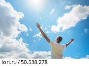 Man strive to the sky. Spirit and emotional scene. . Стоковое фото, агентство Ingram Publishing / Фотобанк Лори