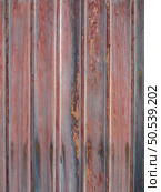 Red painted old wooden wall. Red background. Стоковое фото, агентство Ingram Publishing / Фотобанк Лори