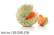 Juicy honeydew melon on a white background. Стоковое фото, агентство Ingram Publishing / Фотобанк Лори