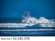 Bodyboarder surfing ocean wave on a sunny winter day. Стоковое фото, агентство Ingram Publishing / Фотобанк Лори