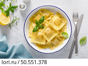 Ravioli with ricotta cheese and fresh basil, top view. Стоковое фото, агентство Ingram Publishing / Фотобанк Лори