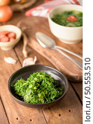 Caldo verde popular soup in Portuguese cuisine. traditional ingredients for caldo verde are potatoes, collard greens , olive oil and salt. Additionally garlic or onion may be added. Стоковое фото, агентство Ingram Publishing / Фотобанк Лори