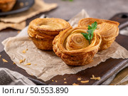 Pastries filled with meat, traditionally baked in black clay molds both from the region on Vila Real, Portugal. Стоковое фото, агентство Ingram Publishing / Фотобанк Лори
