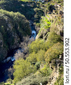 View of the Corgo River valley from the metal bridge that joins the banks of the city of Vila Real. Стоковое фото, агентство Ingram Publishing / Фотобанк Лори