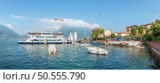 Scenic view of the marina with a ferry in Varenna on Lake Como. Стоковое фото, агентство Ingram Publishing / Фотобанк Лори