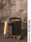 Coffee mug on a dark slate, stone or concrete background. Стоковое фото, агентство Ingram Publishing / Фотобанк Лори