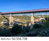 The Corgo river metallic road bridge was opened in May 1904 and joins the banks of the city of Vila Real. Стоковое фото, агентство Ingram Publishing / Фотобанк Лори