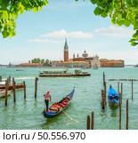 Gondolas in Grand Canal in Venice, Italy. Boats on a beautiful canal. Стоковое фото, агентство Ingram Publishing / Фотобанк Лори
