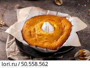 Portuguese sponge cake wrapped in the typical paper used on the baking. Стоковое фото, агентство Ingram Publishing / Фотобанк Лори