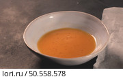 Bowl with egg yolk on a kitchen counter. Стоковое фото, агентство Ingram Publishing / Фотобанк Лори